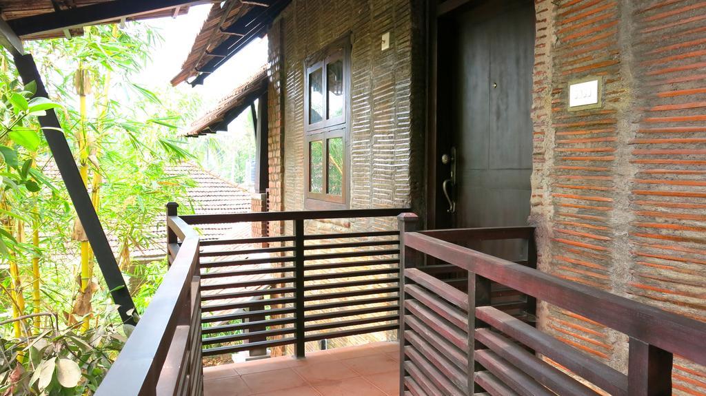 Clayfingers Art Cottage Thrissur Rum bild